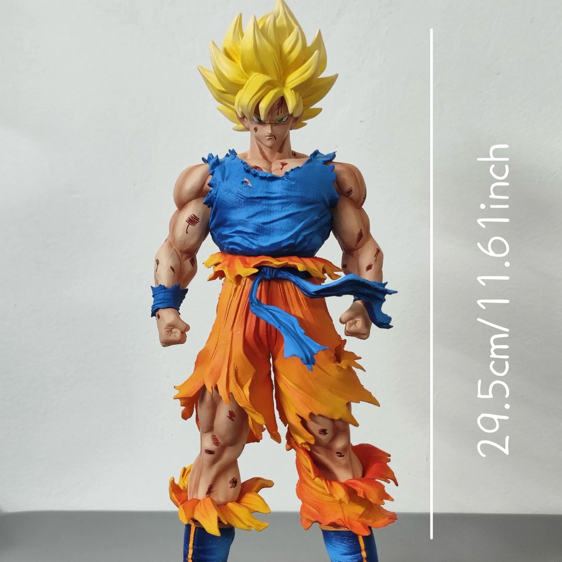 DRAGON BALL Z Action Figure - Muscular Goku Collectible Statue with Dynamic Pose & Iconic Blue & Anime Outfit, Display-Worthy for Fans, Detailed Male Model Figure for Decor, Christmas/Halloween Gift (Officially Inspired)